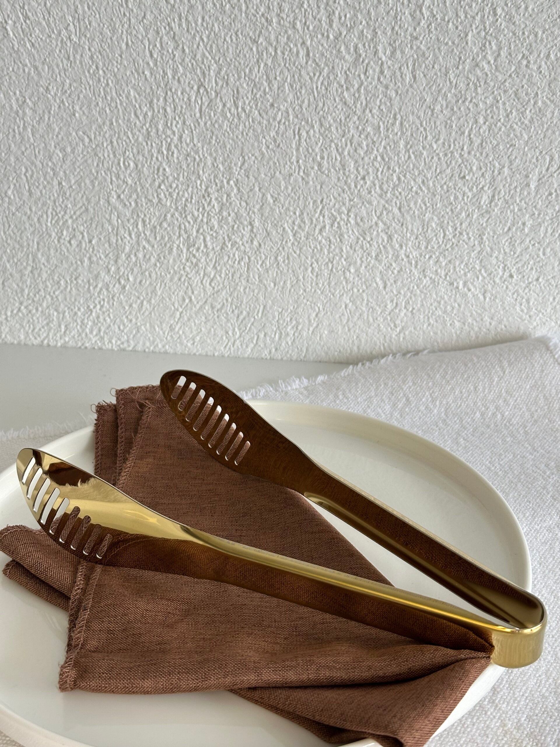 Elegance Servierzange Gold